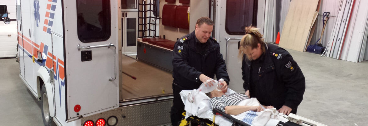 EMT Working with Patient