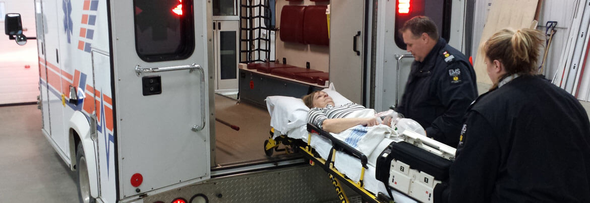 EMTs with Patient on Stretcher